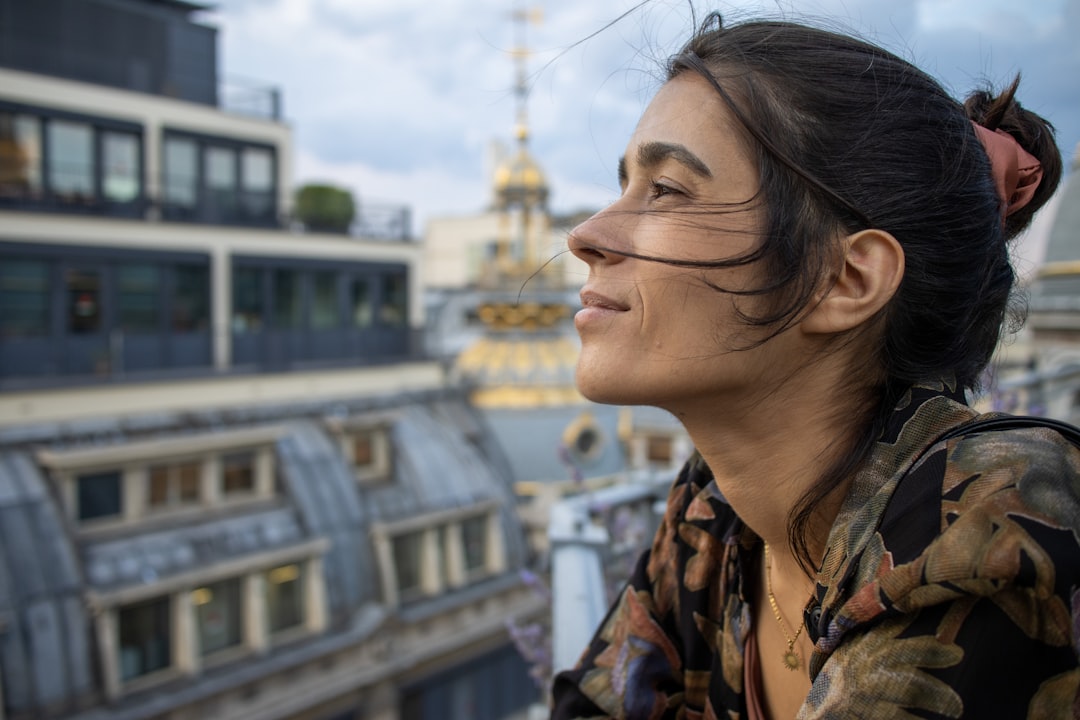 a person looking down at a city